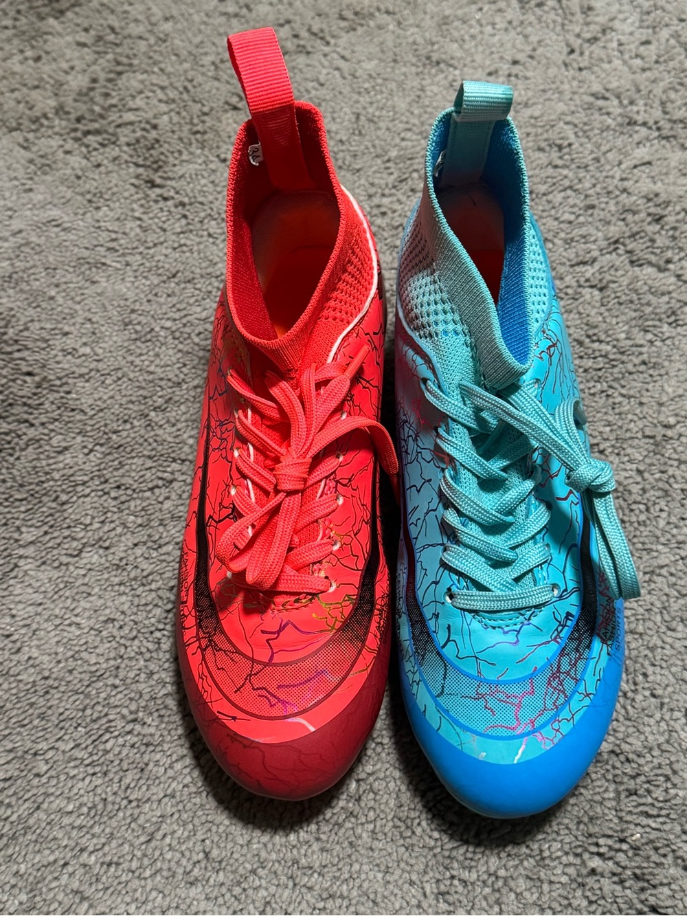 Kids Red and Teal Athletic Lace-Up cleats.